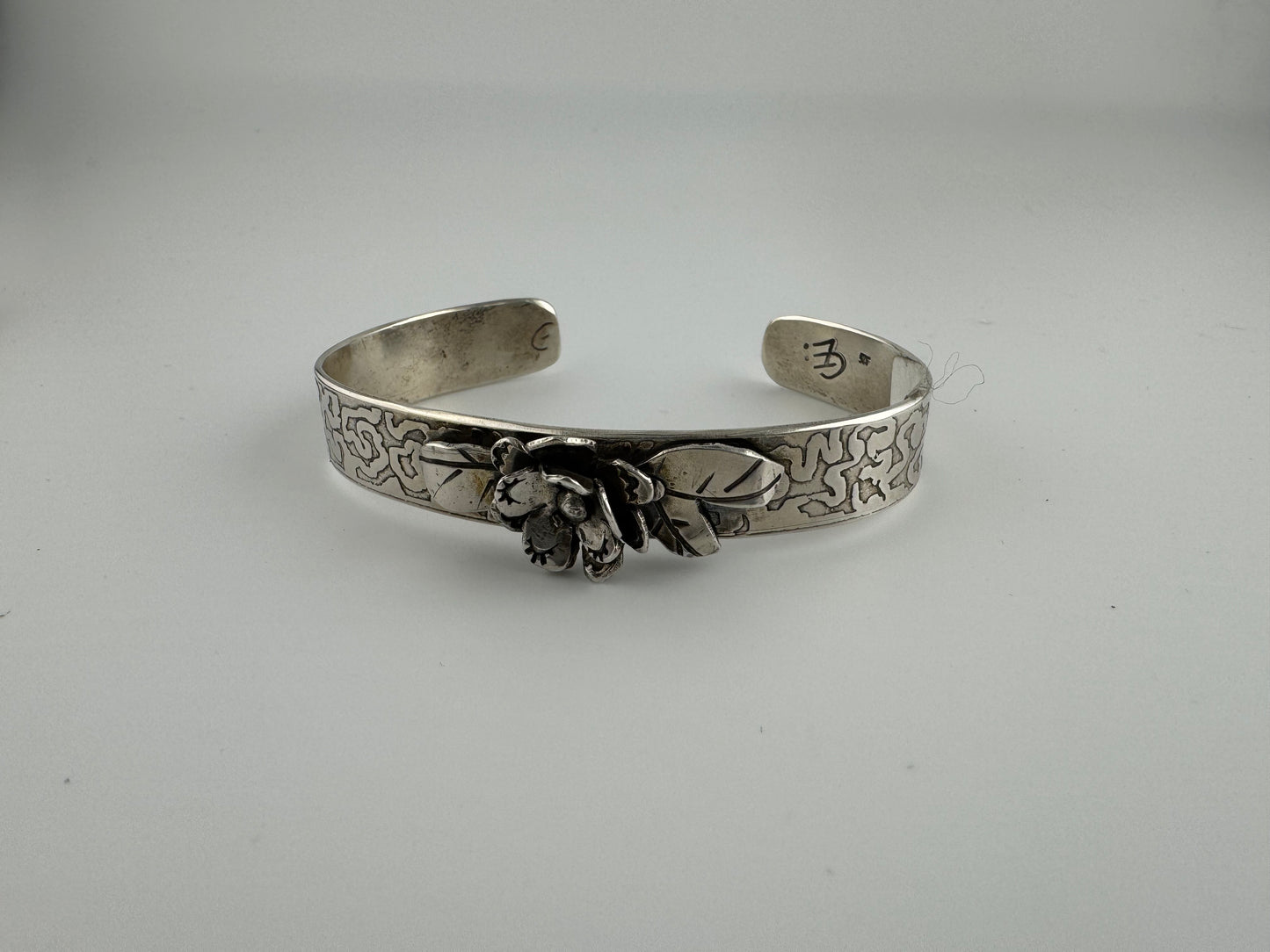 Silver flower cuff bracelet
