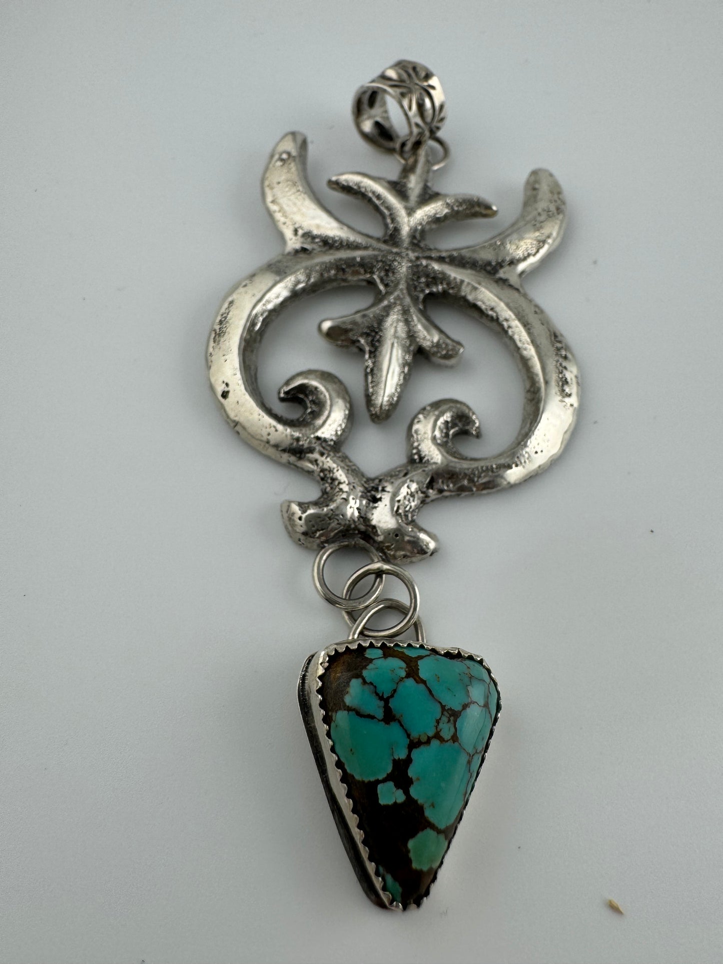 Silver pendant with turquoise