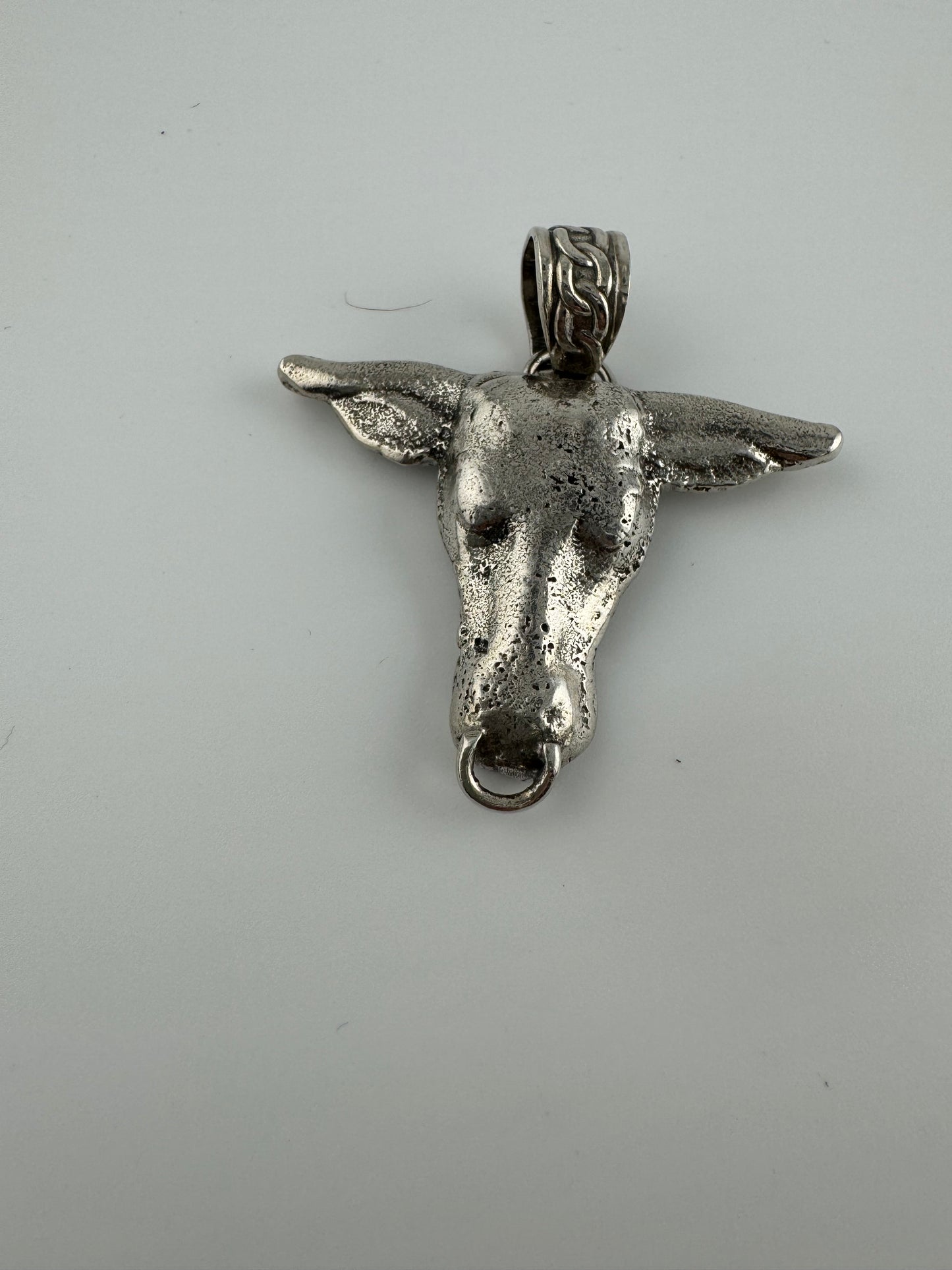 Colgante de cabeza de toro