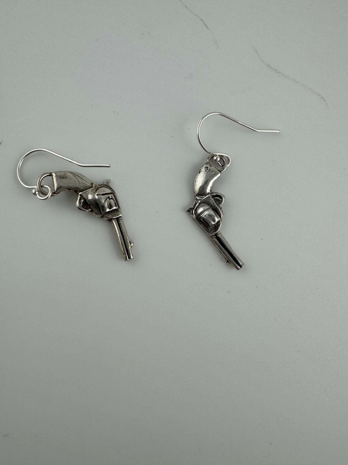 Pendientes de pistola