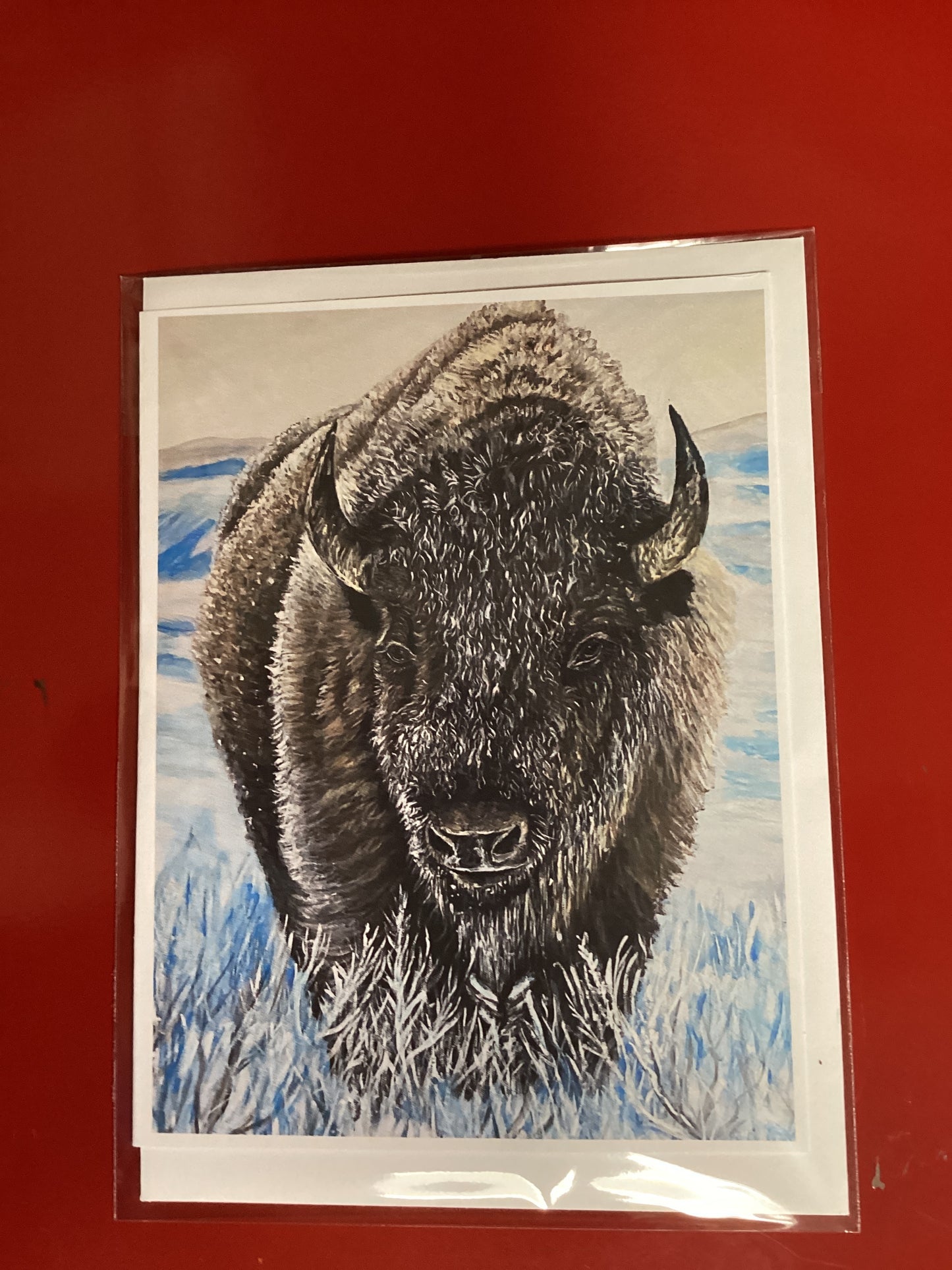 Tarjeta de búfalo en la nieve