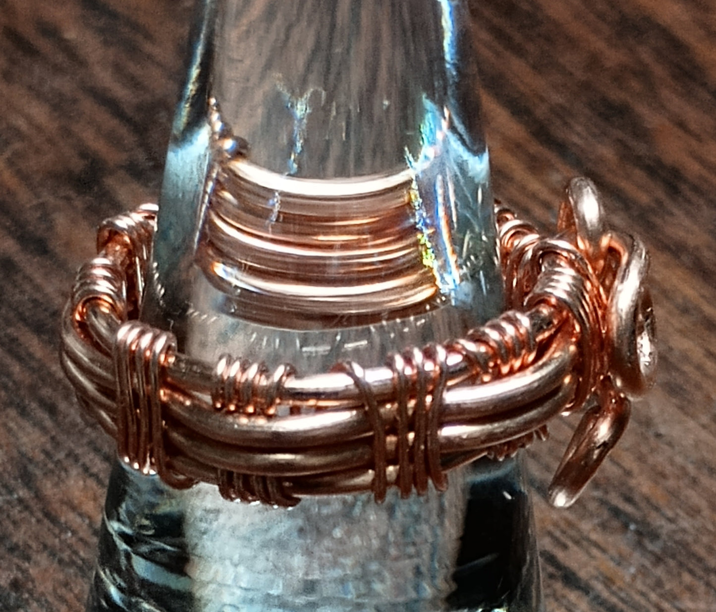Hand woven copper ring.
