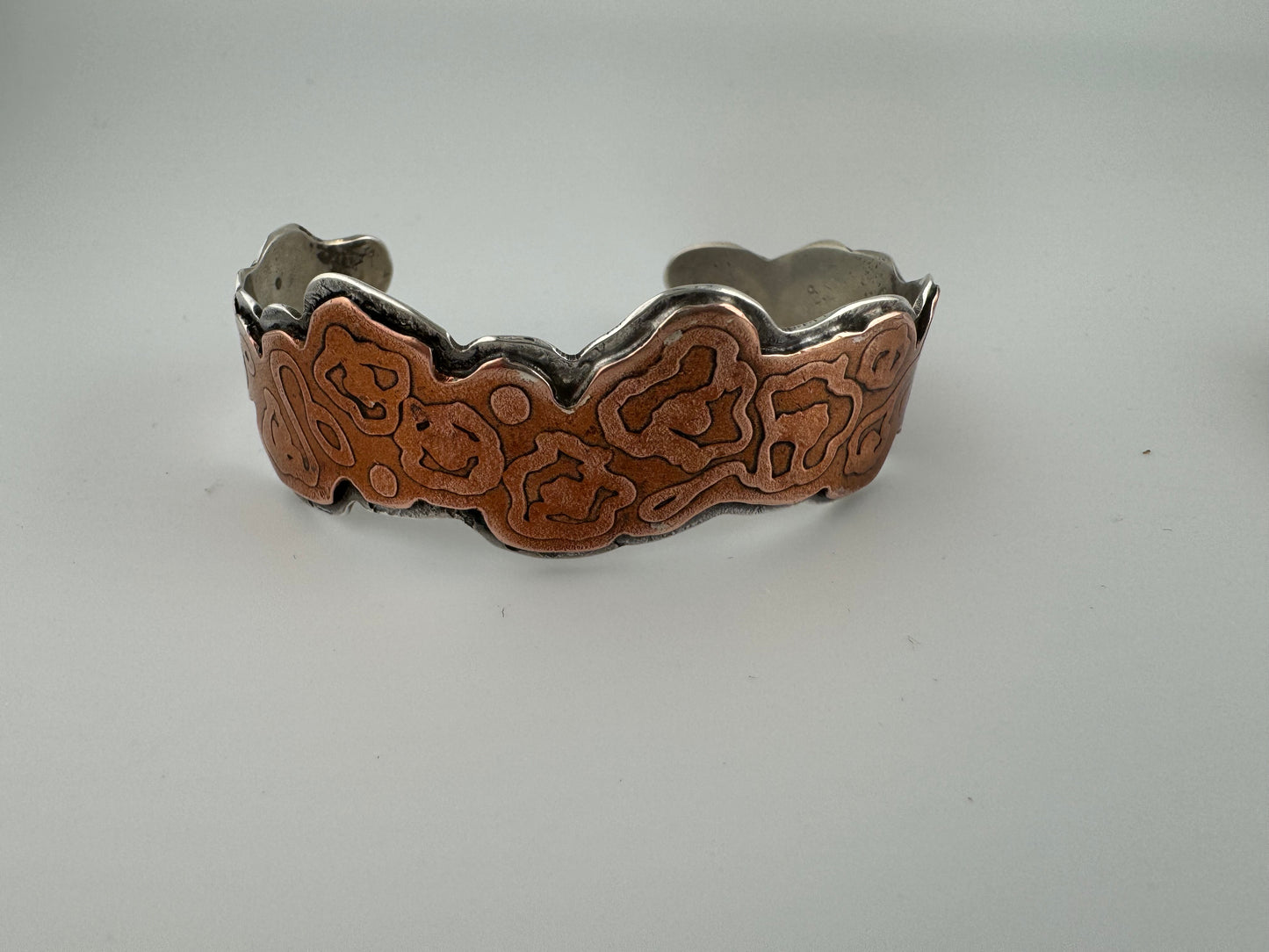 Etched copper on silver cuff