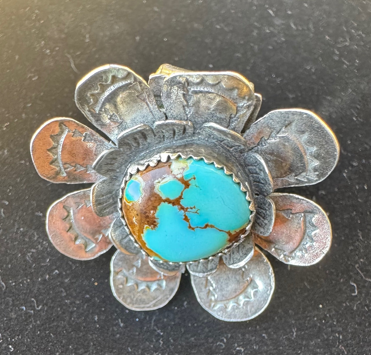 Silver flower with turquoise ring