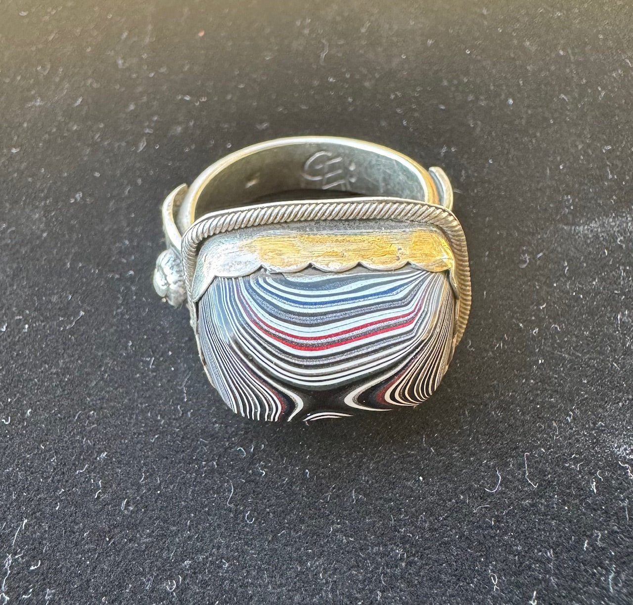 Fordite set in silver