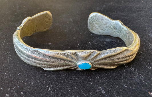 Sandcast cuff with turquoise