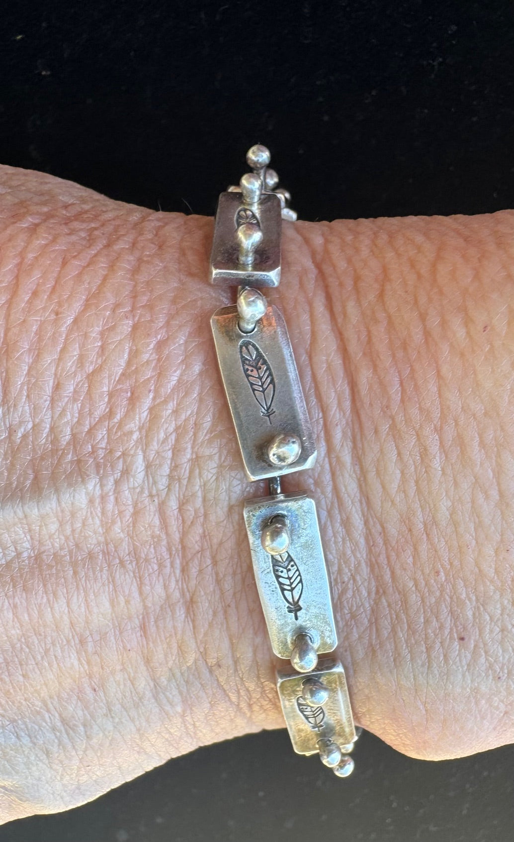 Feather link bracelet